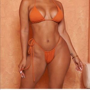 Orange string bikini - Never worn, brand new.
